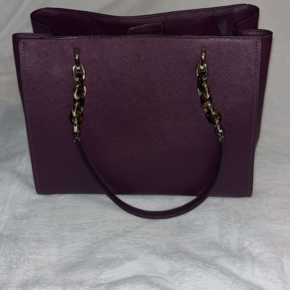Brand new dark purple Michael Kors purse! Buttons at the top. Divides in center - Picture 6 of 6